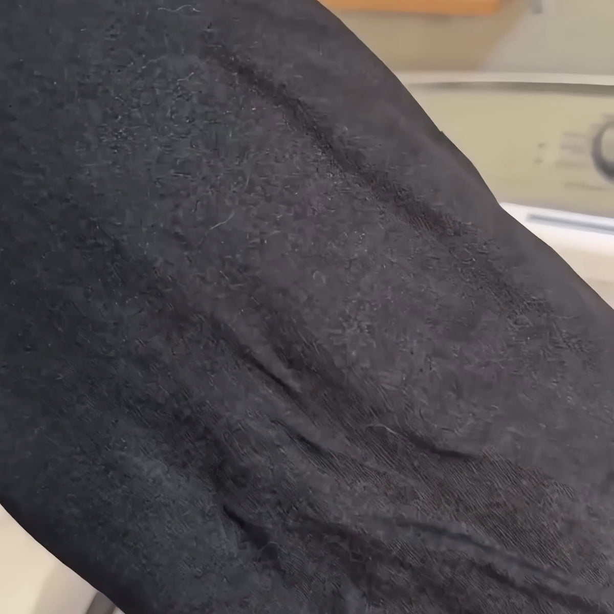 Clean black fabric after washing